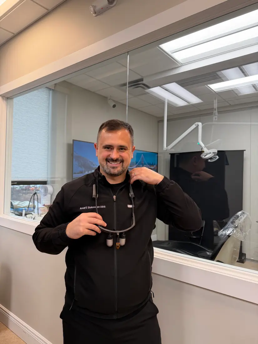 Dr. Slobodian working under magnification with surgical loupes